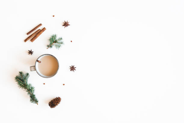 istock Christmas composition. Cup of coffee, fir tree branches on white background. Christmas, winter, new year concept. Flat lay, top view 1282477057
