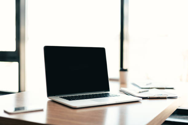 istock close up. open laptop on the office Desk 1282477073