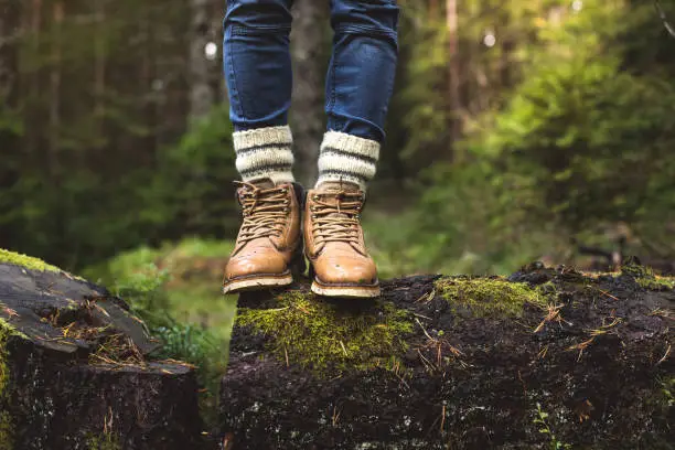 Hiker walks on Mountain Trail