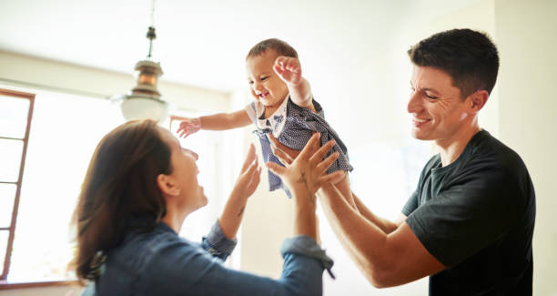 istock Couple playing with their daughter 1282481224