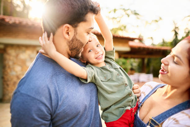 istock Girl enjoying with her parents 1282481391