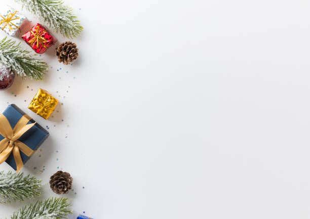 istock Christmas background with pine gift box and decoration glitter on white background. Merry christmas and Happy new year festival concept. 1282484790