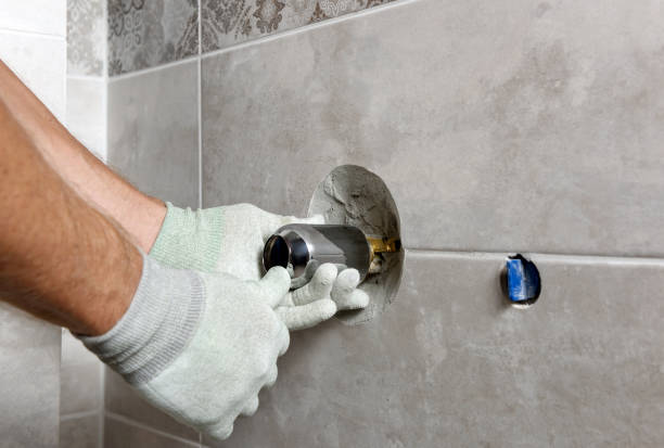 istock Installing the built-in faucet. 1282487752
