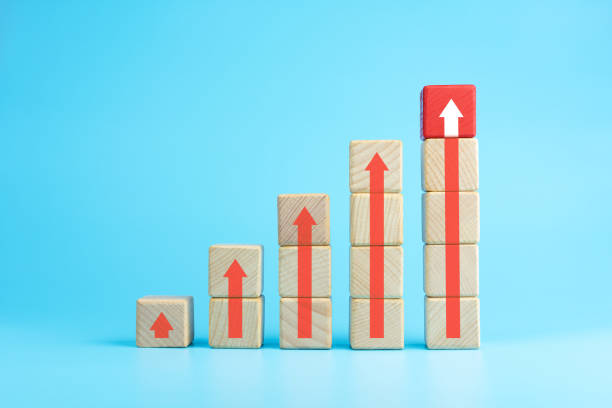istock Wooden blocks stacking as step stair with red arrow up, blue background, Business growth success process concept, copy space 1282488565