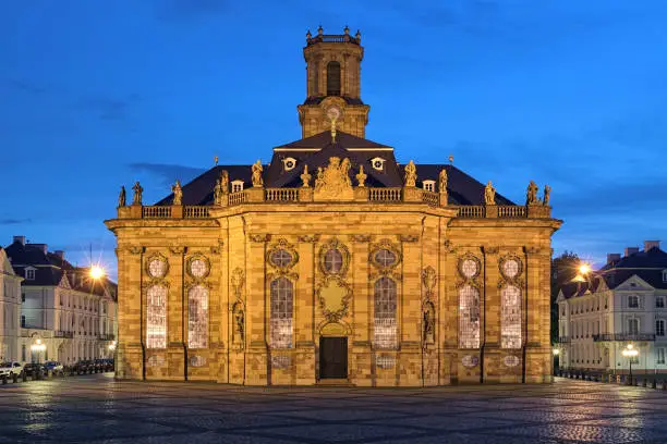 Ludwigskirche in Saarbrucken in twilight, Germany. The Lutheran baroque-style church was built in 1762-1775 by design of architect Friedrich Joachim Stengel, and named after Louis (Ludwig), Prince of Nassau-Saarbrucken.