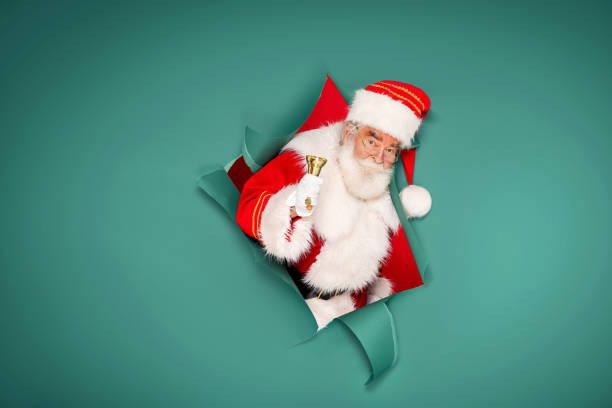 istock Santa Claus with golden bell 1282494815