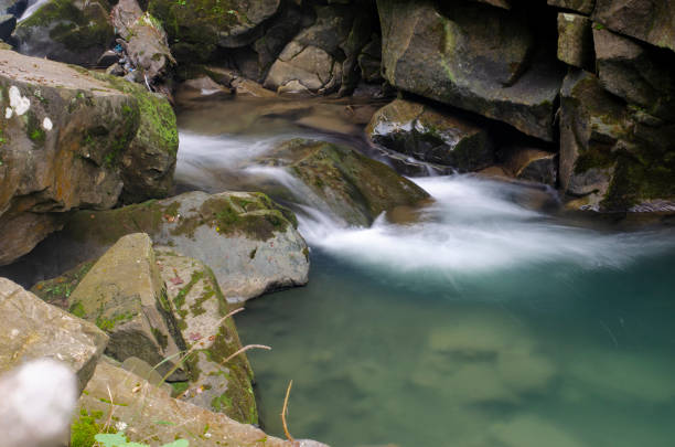 istock Beautiful mountain river in Carpathians 1282494877