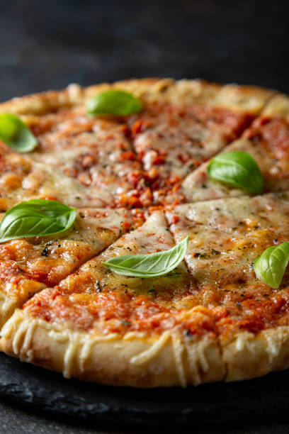 istock Margarita pizza with fresh basil 1282495356