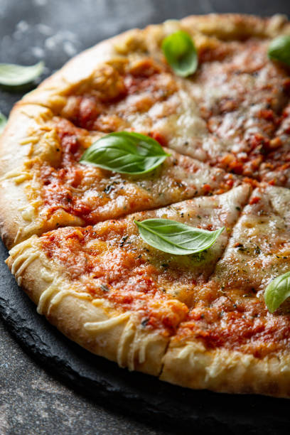 istock Margarita pizza with fresh basil 1282495375
