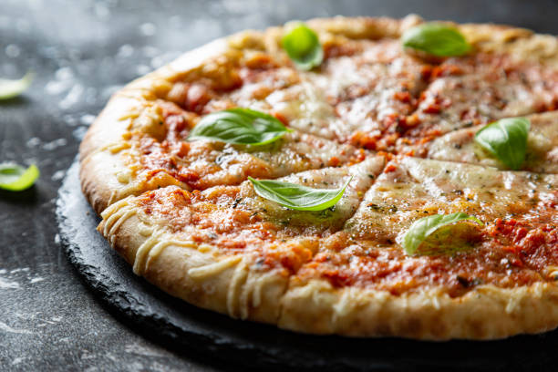 istock Margarita pizza with fresh basil 1282495915