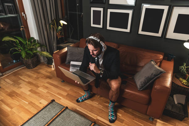 istock Video conferencing from living room 1282499036