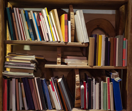 Collection of books on shelves.