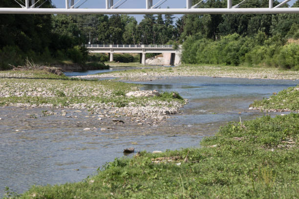 istock Stream with Pebbles and few Water in the Spring 1282500583