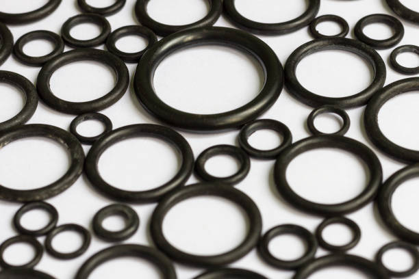 A set of rubber O-rings used for sealing in hydraulic and pneumatic mechanisms A set of black rubber O-rings used for sealing in hydraulic and pneumatic mechanisms. gasket stock pictures, royalty-free photos & images
