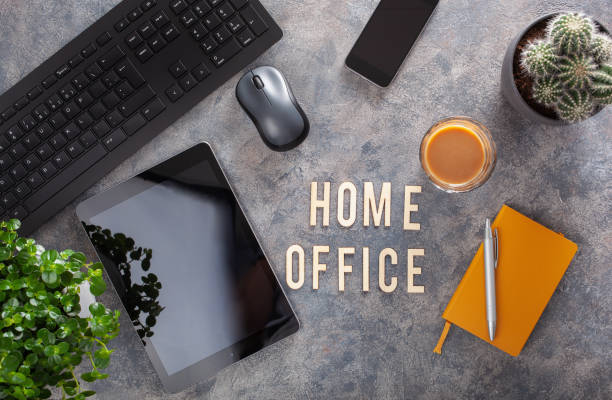 istock home office text desk with keyboard computer smartphone notebook houseplants, workspace at home 1282509270