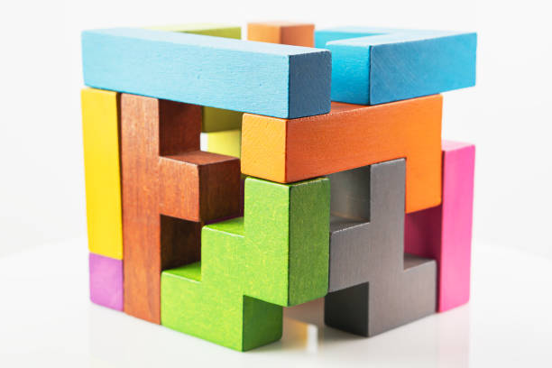 istock Cube made of multicolored wooden figures. 1282512370