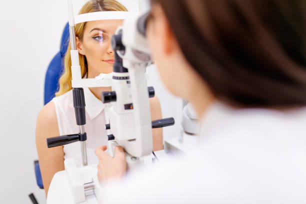 istock Young woman at the ophthalmologist's checking eyesight 1282514926
