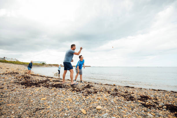 istock Skimming Stones With Dad 1282516839