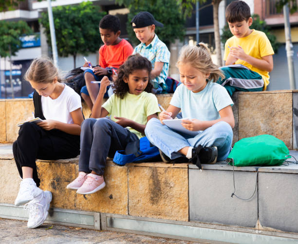 istock Group of kids having open air lesson 1282520331