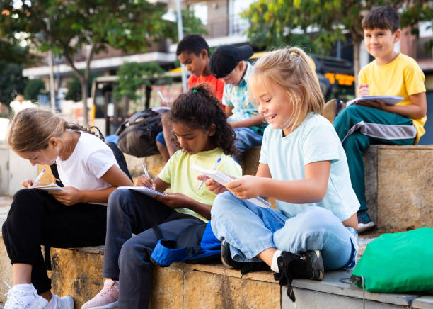 istock Group of kids having open air lesson 1282520332