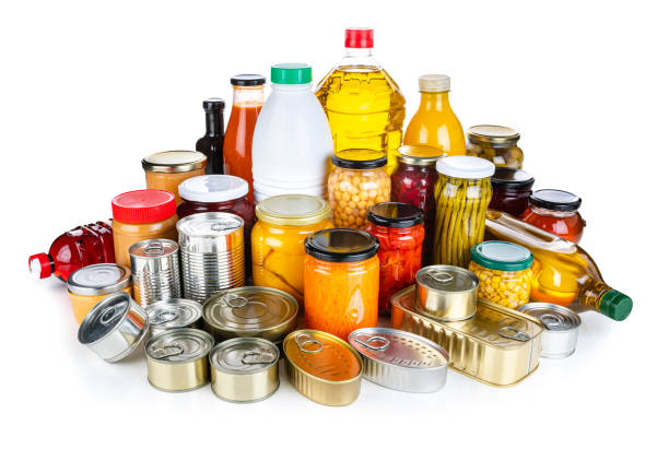 istock Non-perishable food: canned goods, conserves, sauces and oils isolated on white background 1282524746