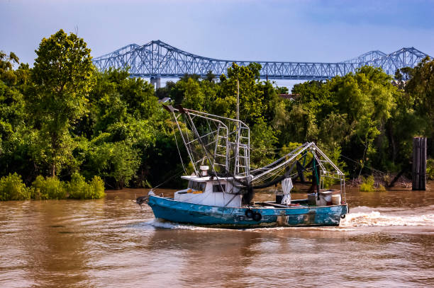 shrimp boat on the muddy Mississippi River