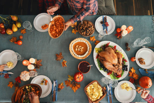 istock Family Having Traditional Holiday Stuffed Turkey Dinner 1282527634