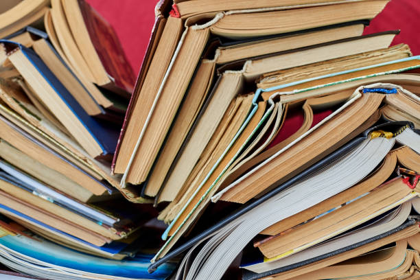 istock Old books piled up in a heap, learning and education concept. 1282528947