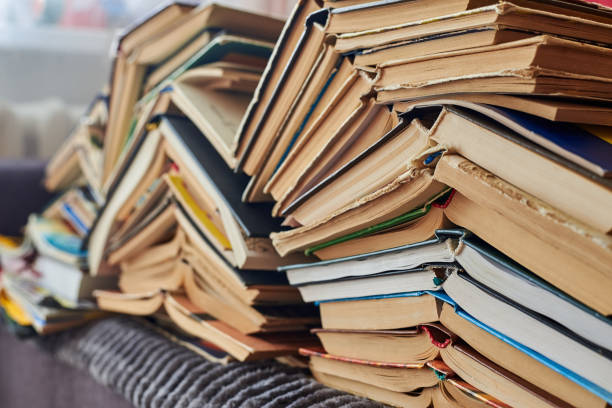 istock Old books piled up in a heap, learning and education concept. 1282529312