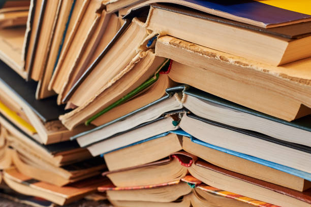 istock Old books piled up in a heap, learning and education concept. 1282529322