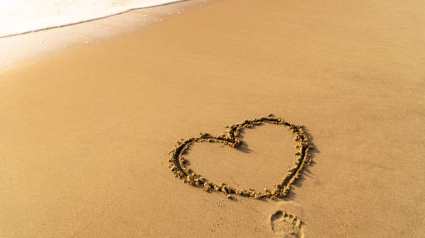 istock Heart shape on a beach.Valentine's Day. 1282529832