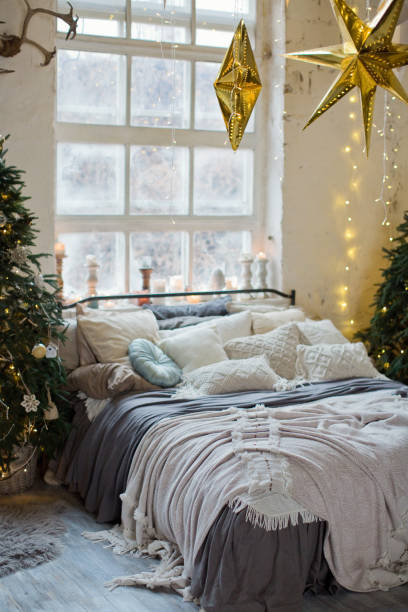 istock Christmas loft bedroom with decorations and lights 1282530812
