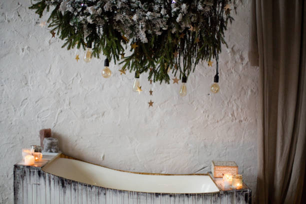 istock Wooden bathtub with candles and lights 1282530849