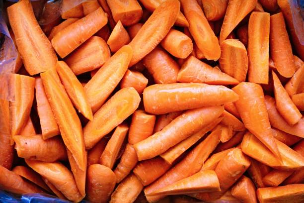 istock Fresh carrots on the market 1282532119