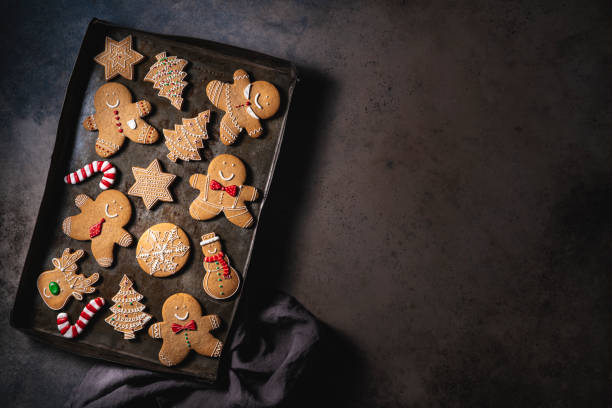 istock Christmas gingerbread man cookies on vintage baking tray 1282532399