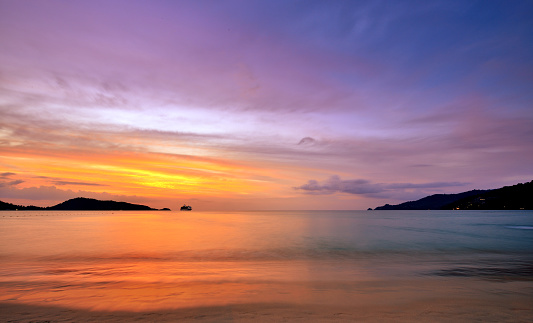 Beautiful patong beach seascape at sunset, Andaman Sea, Phuket, Thailand.