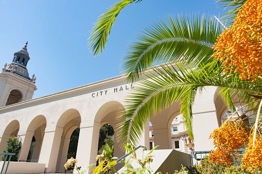 Pasadena City Hall facade with tropicla palm in Mediterranean Revival and Spanish Colonial Revival Styles