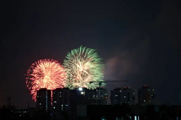 fireworks in the middle of the dark city night