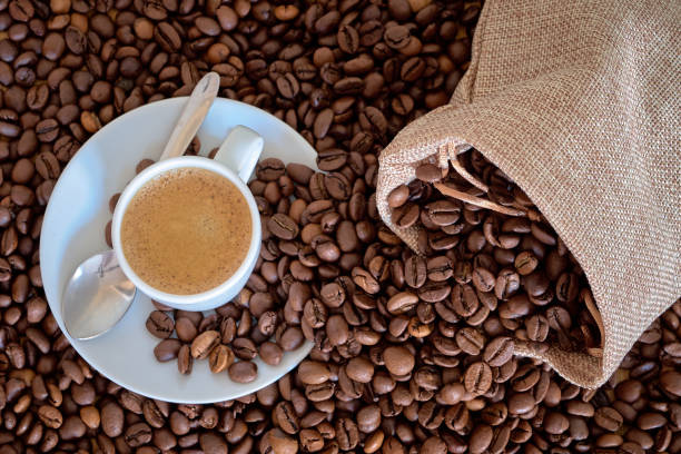 istock Coffee beans in a sack and a cup of coffee 1282537496