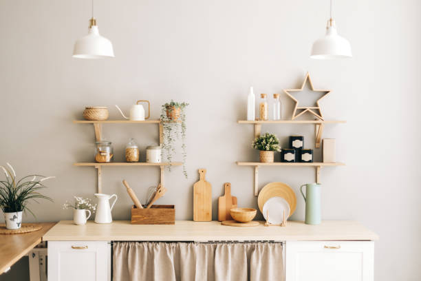 istock Kitchen with wooden dishes and kitchen accessories on the table and shelves. 1282538156