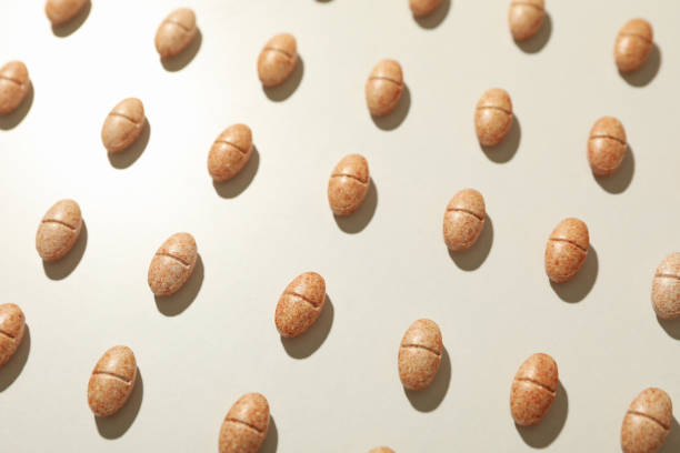 istock Flat lay with pills on gray background, close up 1282538290