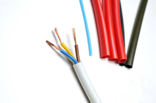istock heat shrink tubing and a three-core stripped wire. 1282540313