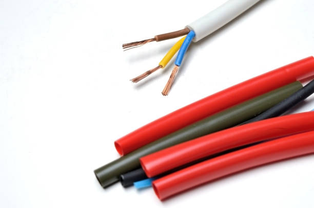 istock heat shrink tubing and a three-core stripped wire. 1282541081