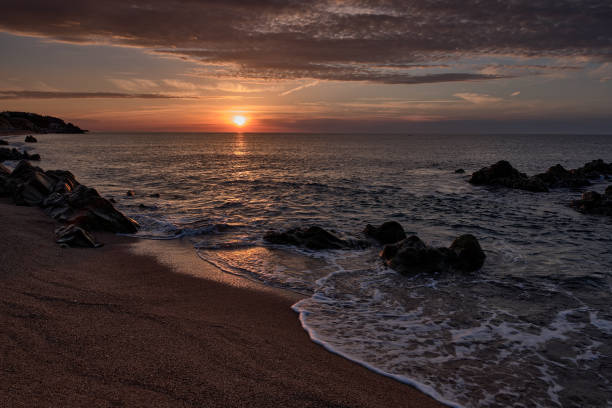 istock Sunrise on Sant Pol beach in Barcelona 1282541381