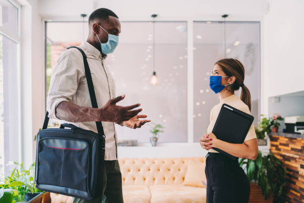 istock Businesspeople during COVID-19 pandemic 1282541601