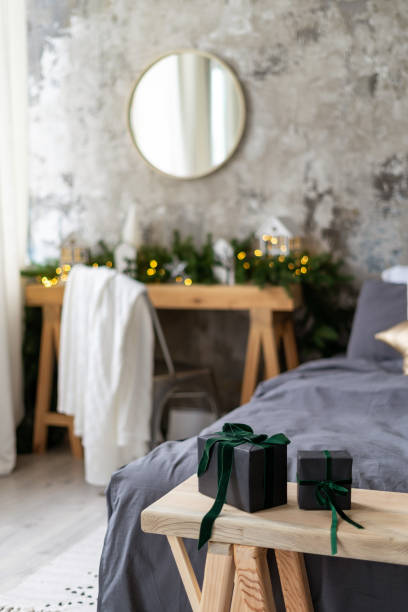 istock Present box on wooden bench in bedroom 1282541654