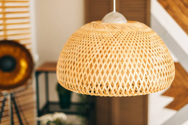 istock Straw lampshade in modern living room. Eco-friendly interior design 1282542343