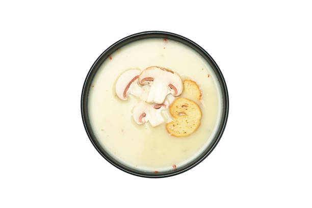 istock Bowl with tasty mushroom soup isolated on white background 1282542558