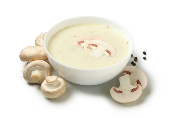 istock Bowl with tasty mushroom soup isolated on white background 1282542876