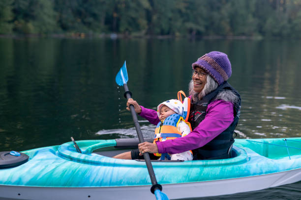 istock Loving grandmother kayaking with grandchild 1282545507